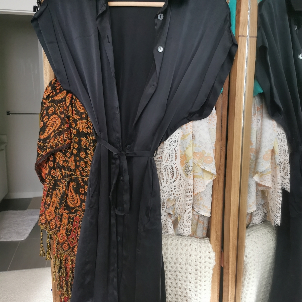 Professional button up black dress.